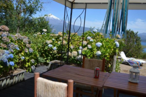 Гостиница Casa Pucón Vista Lago y Volcan  Пукон